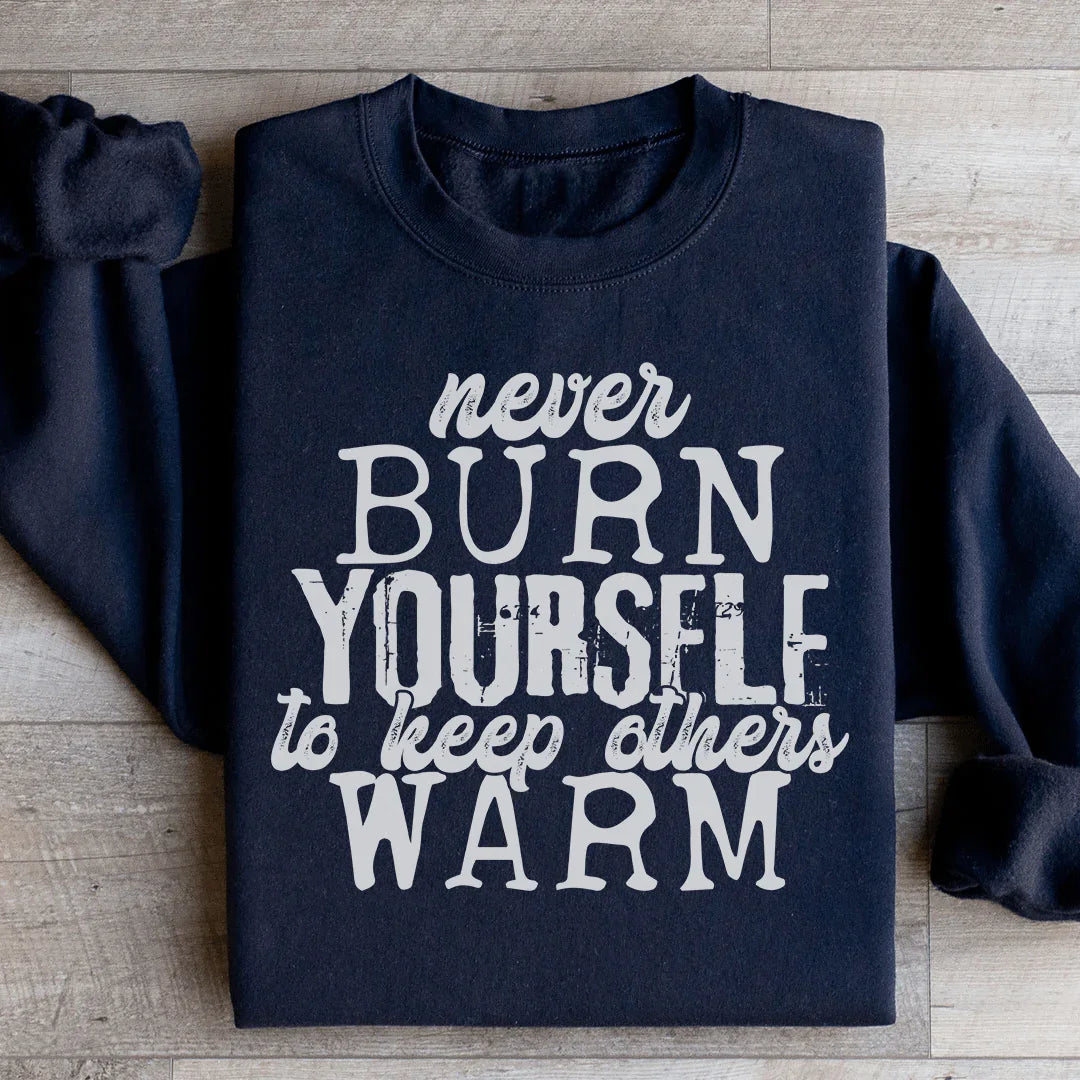 Sudadera "Nunca te quemes para mantener calientes a los demás"