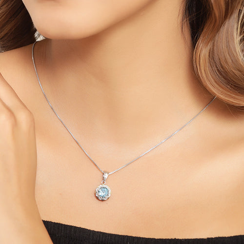 Colgante de Topacio Azul Suizo de 2.32 Quilates y Diamantes en Oro de 14K y Plata Esterlina