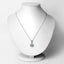 Colgante de Topacio Azul Suizo de 2.32 Quilates y Diamantes en Oro de 14K y Plata Esterlina