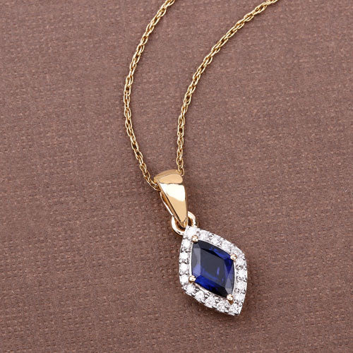 Colgante de Zafiro Azul y Diamante de 0.92 Quilates en Oro de 14K