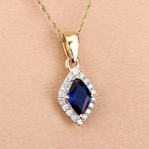 Colgante de Zafiro Azul y Diamante de 0.92 Quilates en Oro de 14K
