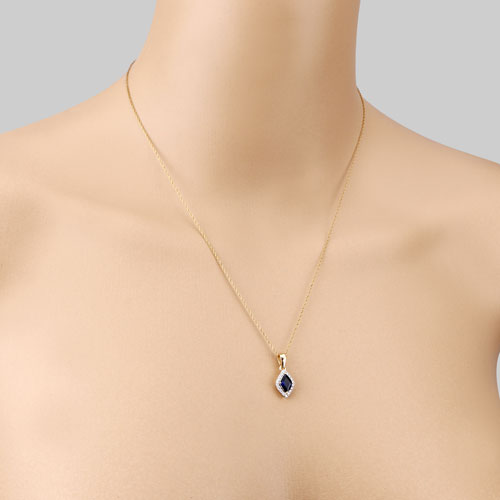 Colgante de Zafiro Azul y Diamante de 0.92 Quilates en Oro de 14K