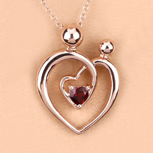 Pendentif en grenat véritable de 0,32 carat en argent sterling .925