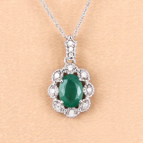 Colgante de Esmeralda Zambiana Genuina de 0.79 Quilates y Diamante Blanco en Oro Blanco de 10K
