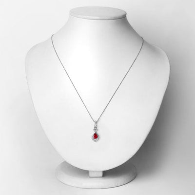 0.86 Carat Ruby and Diamond 14K White Gold Pendant