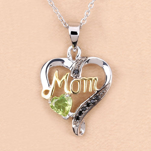 Pendentif en péridot véritable de 0,49 carat et spinelle noir en argent sterling