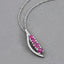 Colgante de Rubí y Diamante Blanco de 0.43 Quilates en Oro Blanco de 14K