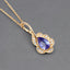 Colgante de Oro Amarillo de 14K con Tanzanita y Diamantes de 0.40 Quilates