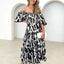 Robe à volants imprimée avec smocks et épaules dénudées