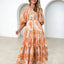 Robe à volants imprimée avec smocks et épaules dénudées