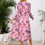 Robe midi à manches longues à encolure croisée imprimée
