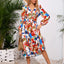 Robe midi à manches longues à encolure croisée imprimée