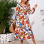 Robe midi à manches longues à encolure croisée imprimée