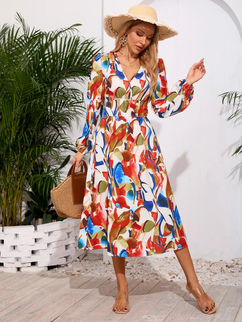 Robe midi à manches longues à encolure croisée imprimée
