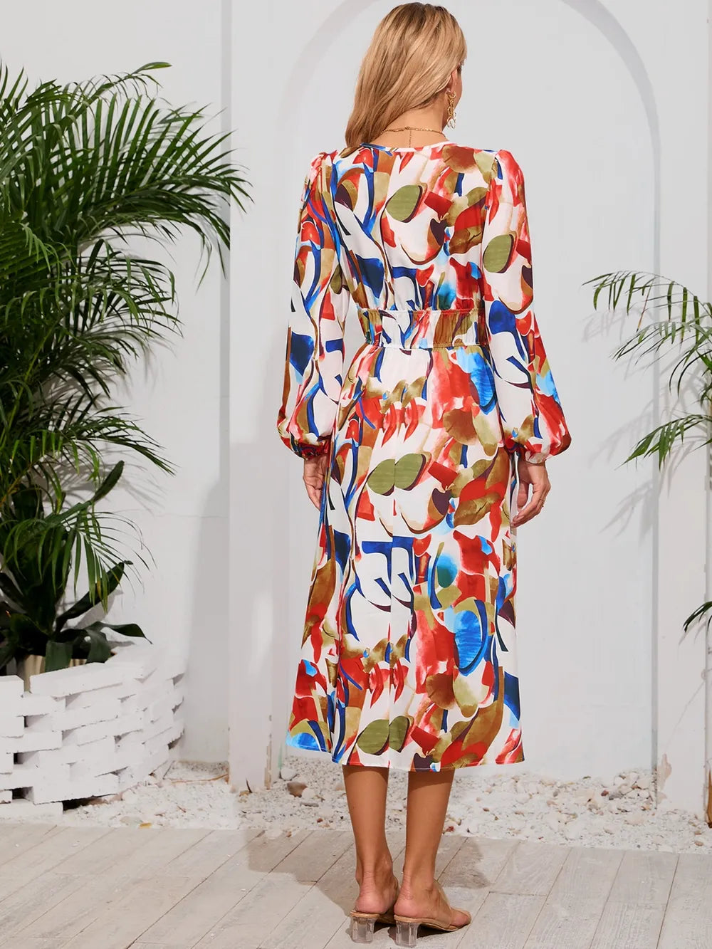 Robe midi à manches longues à encolure croisée imprimée