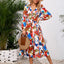 Robe midi à manches longues à encolure croisée imprimée