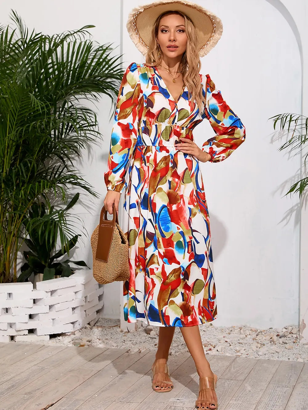 Robe midi à manches longues à encolure croisée imprimée