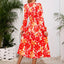 Robe midi à manches longues à encolure croisée imprimée