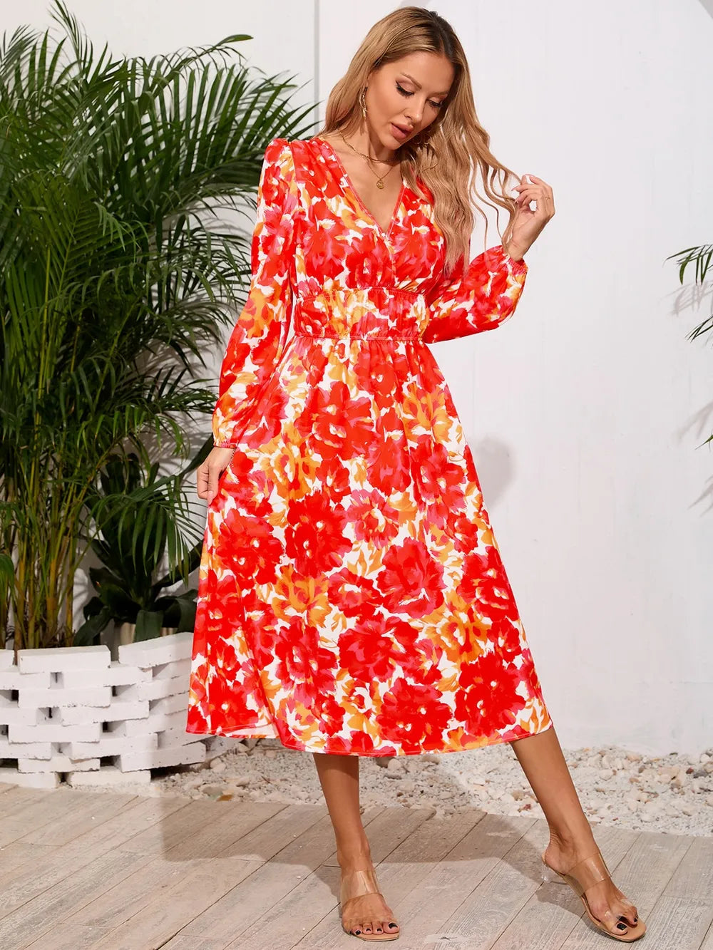 Robe midi à manches longues à encolure croisée imprimée
