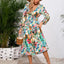 Robe midi à manches longues à encolure croisée imprimée