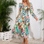 Robe midi à manches longues à encolure croisée imprimée
