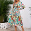 Robe midi à manches longues à encolure croisée imprimée