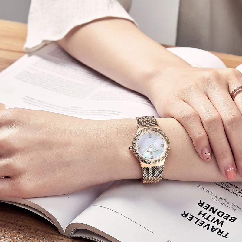 Montre analogique de luxe pour femmes avec affichage de la date et bracelet en acier inoxydable