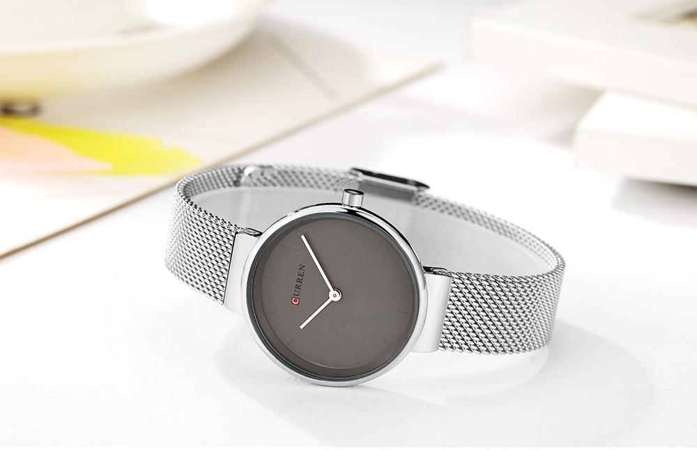 Montre en acier inoxydable décontractée pour femmes avec bracelet en tricot
