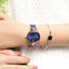 Montre analogique élégante en or rose pour femme avec bracelet en acier inoxydable
