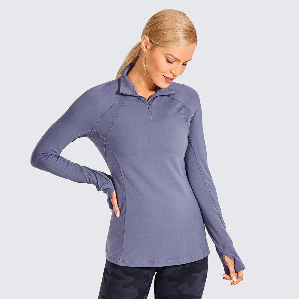 Camisa de entrenamiento deportiva de manga larga con cremallera de cuarto para mujer