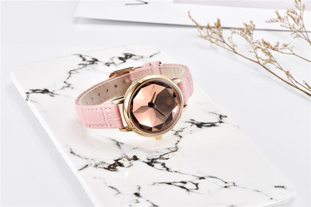 Montre analogique étanche pour femmes au style élégant avec bracelet en cuir
