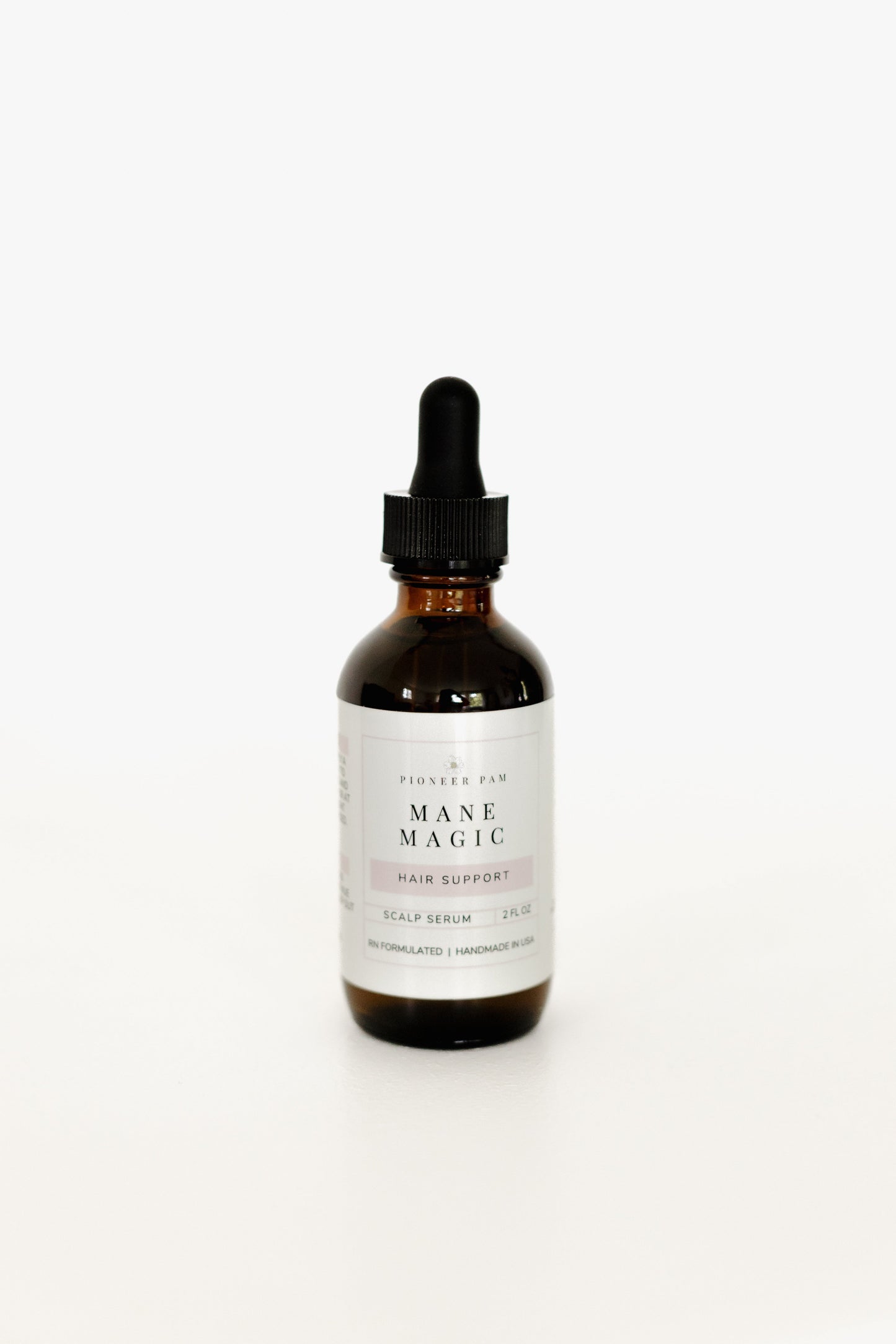 Mane Magic : Huile pour la croissance des cheveux et le cuir chevelu