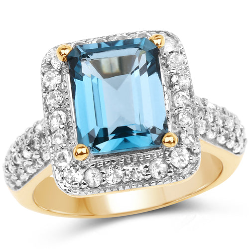 Anillo de Topacio Azul Londres y Topacio Blanco Bañado en Oro Amarillo de 14K