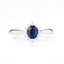 Bague Halo en Saphir Bleu et Diamants de 0,44 Carat en Or Blanc 14K