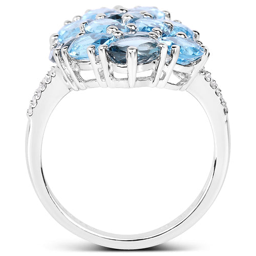 Anillo de plata esterlina con topacio azul suizo genuino de 6.69 quilates y zirconia blanca