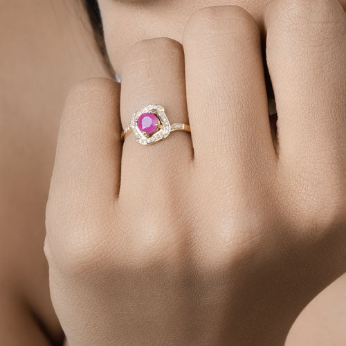 0.63 Carat Ruby and Diamond Halo Ring in 14K Yellow Gold
