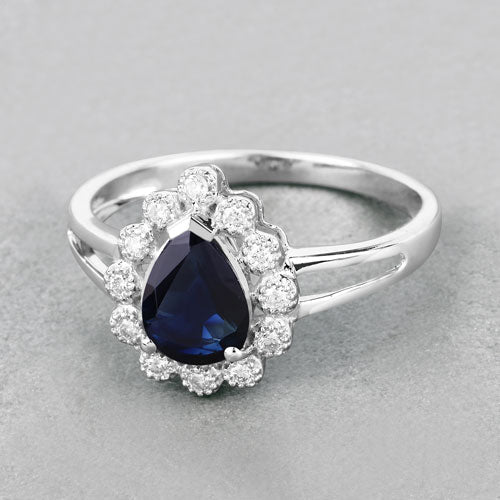 1.46 Carat Blue Sapphire and Diamond Halo Ring in 10K White Gold
