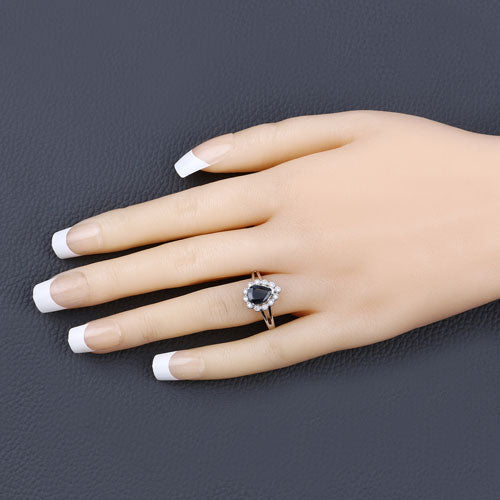 1.46 Carat Blue Sapphire and Diamond Halo Ring in 10K White Gold