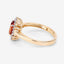 Anillo de 1.87 quilates de granate espessartita y diamante en oro amarillo de 14 quilates