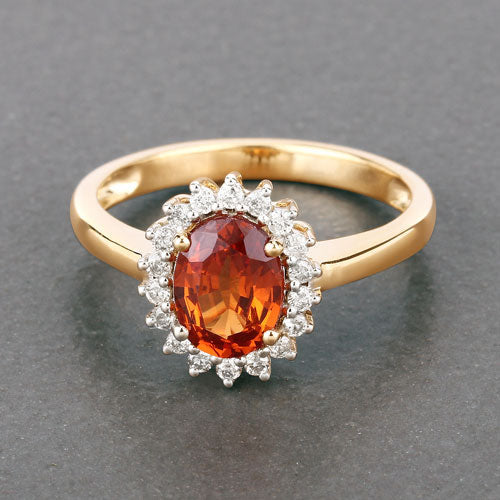 Anillo de 1.87 quilates de granate espessartita y diamante en oro amarillo de 14 quilates