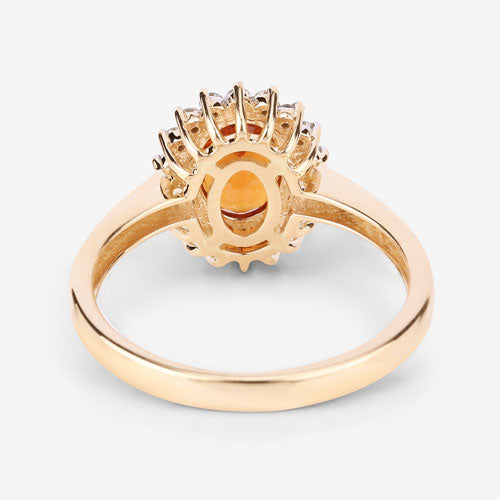 Anillo de 1.87 quilates de granate espessartita y diamante en oro amarillo de 14 quilates