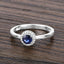 Bague de fiançailles en saphir bleu et diamant de 0,52 carat en or blanc 14 carats