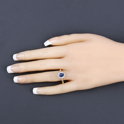 Anillo Halo de Zafiro Azul y Diamantes de 1.11 Quilates en Oro Amarillo de 10K