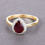 1.30 Carat Ruby and Diamond Halo Ring in 14K Yellow Gold