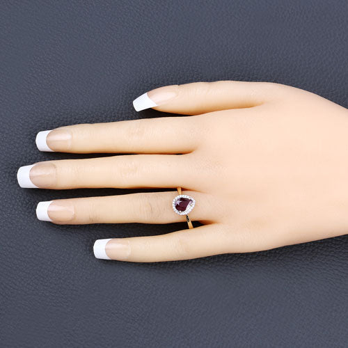 1.30 Carat Ruby and Diamond Halo Ring in 14K Yellow Gold