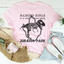Camiseta "Criar niñas es un paseo por el parque"