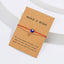 Handmade Adjustable Red String Bracelet with Blue Eye Charm