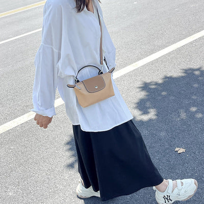 Retro fashion versatile women's bag, shoulder crossed, carrying high-end nylon dumpling bag - Korvel