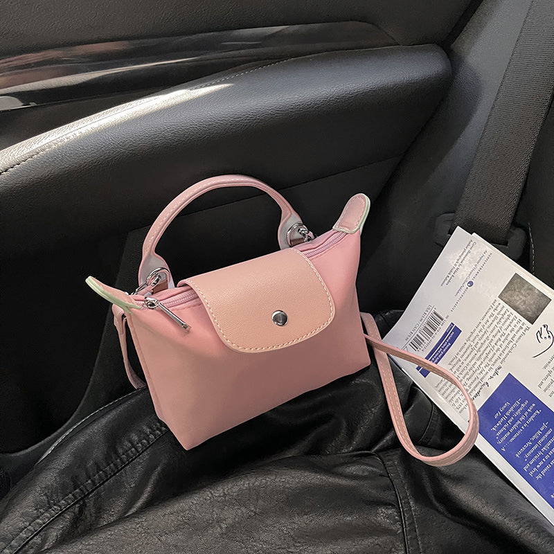 Retro fashion versatile women's bag, shoulder crossed, carrying high-end nylon dumpling bag - Korvel