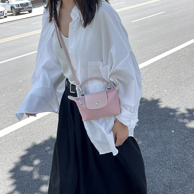 Retro fashion versatile women's bag, shoulder crossed, carrying high-end nylon dumpling bag - Korvel